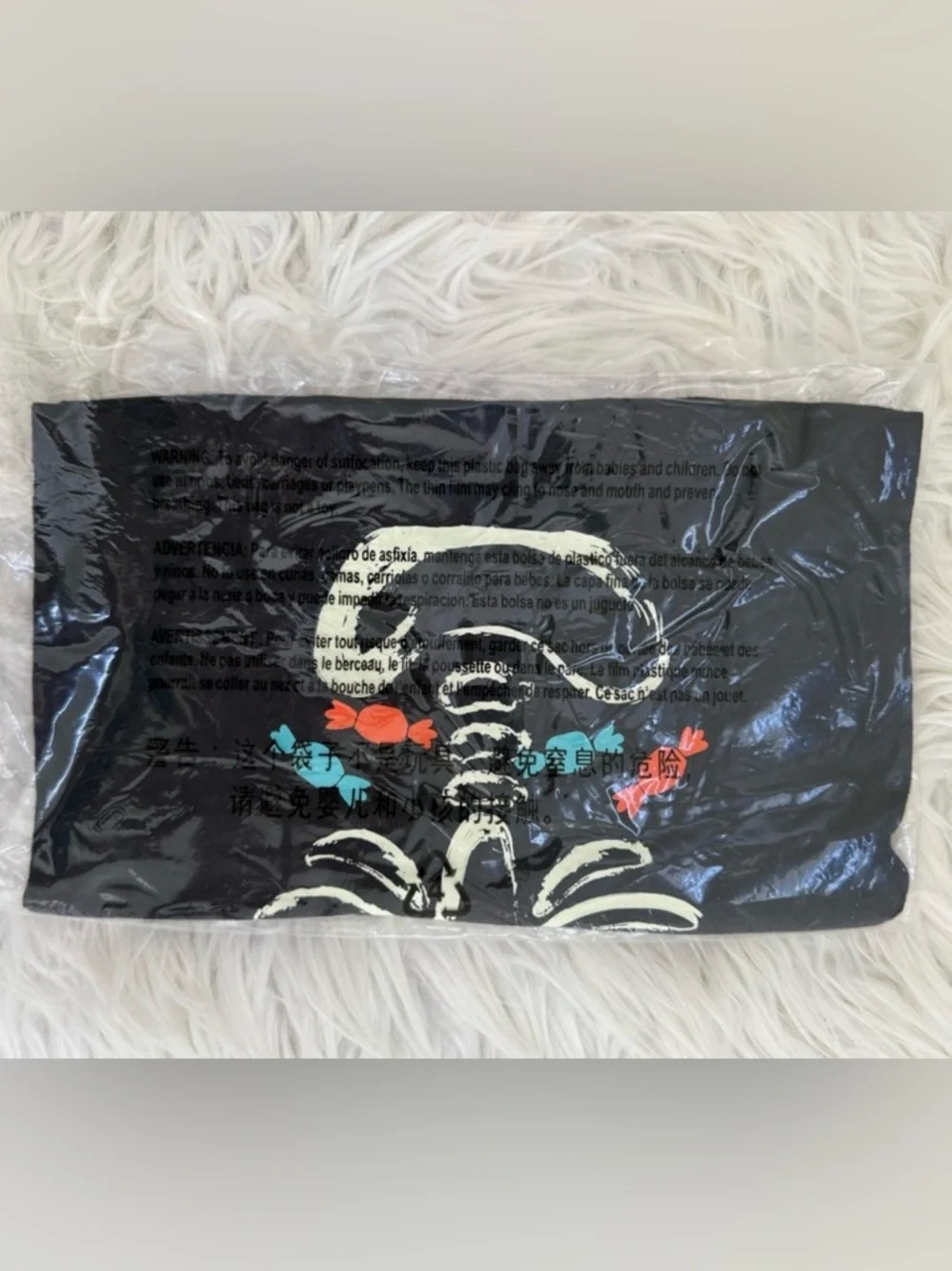 Carter’s Glow in the Dark Skeleton Halloween Candy Shirt